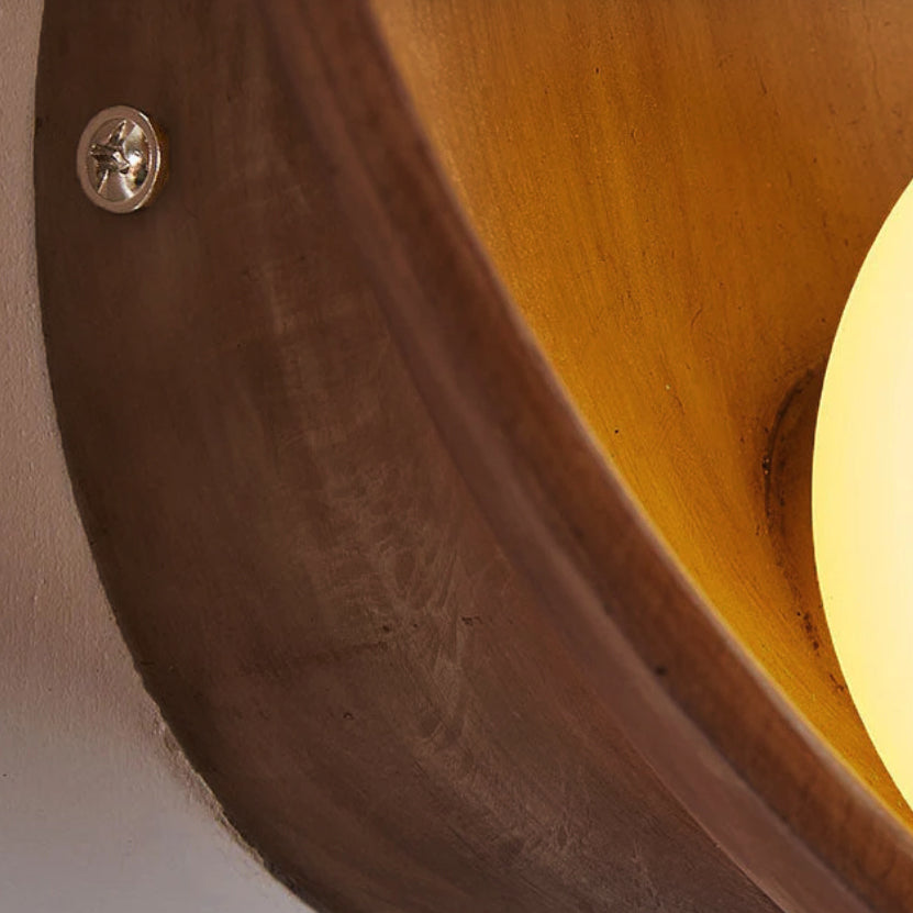 Sleek Modern Round Wall Sconce with Resin & Iron Accent Lighting