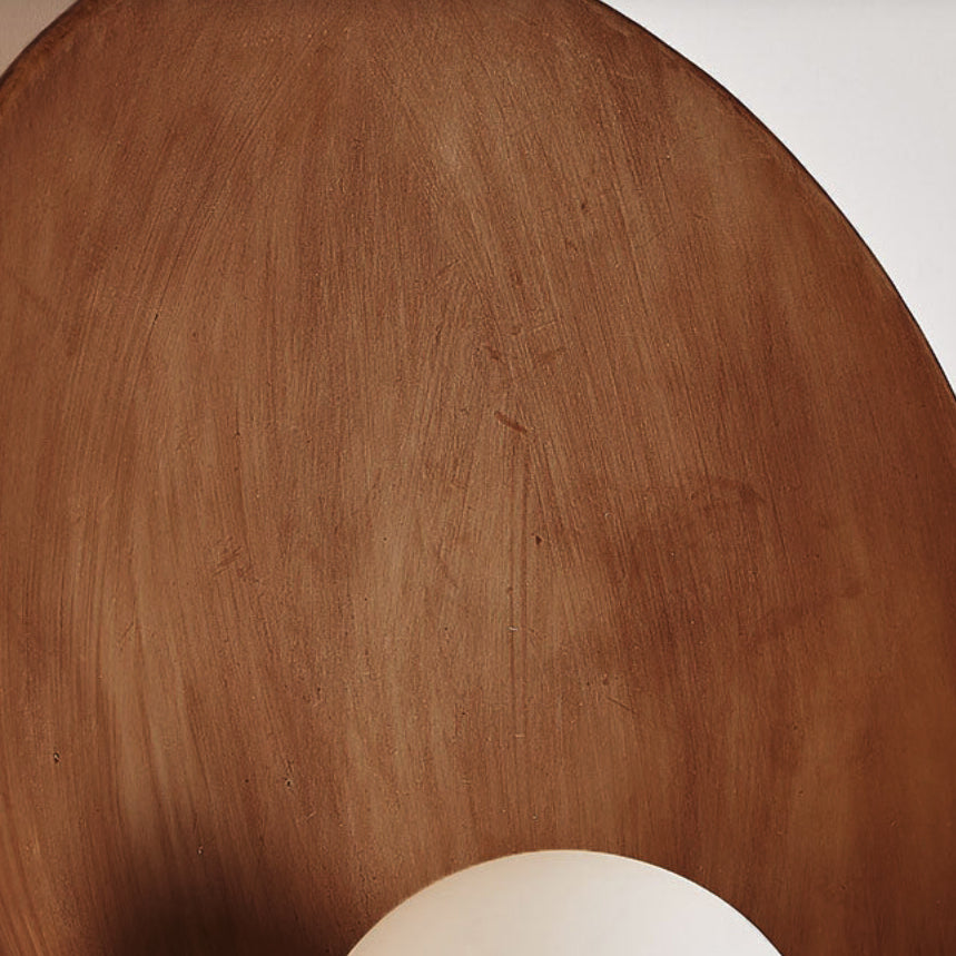 Sleek Modern Round Wall Sconce with Resin & Iron Accent Lighting