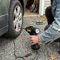Cordless Portable Tire Inflator in lifestyle setting